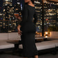 back view of 
Black ruched bodycon midi dress with boat neckline and figure-enhancing fit