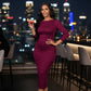 front view of Burgundy ruched bodycon midi dress with elegant boat neckline
